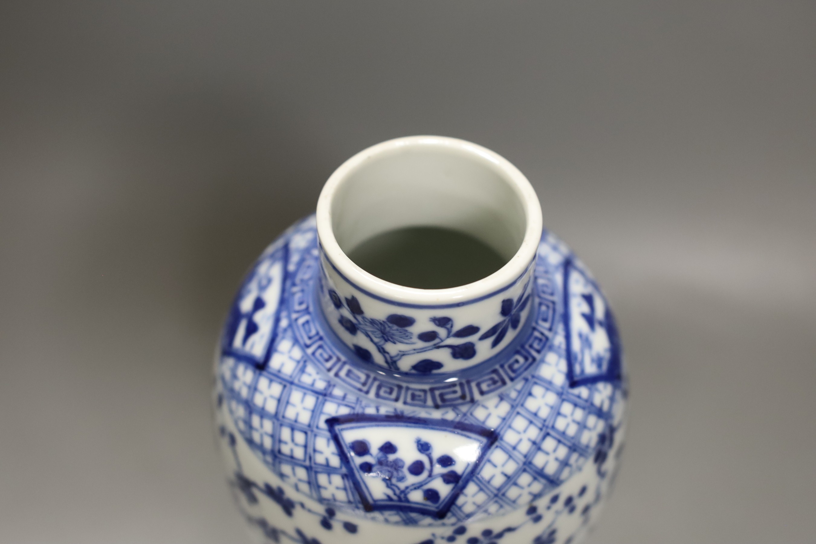 A 19th century Chinese blue and white 'boys and jar' vase and cover 28cm